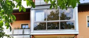 Mehr über den Artikel erfahren Terrassenüberdachung mit Glasschiebetüren Terrassendach mit Glasschiebewand